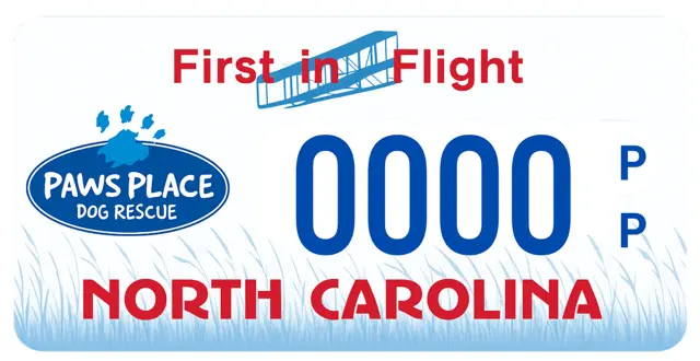 First in Flight, North Carolina license plate with Paws Place